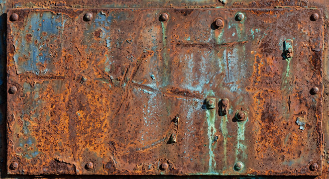 Rusty Metal Texture Vintage oxidized metal panel with blue and copper corrosion, distressed industrial surface, premium weathered texture, ultra detailed background.