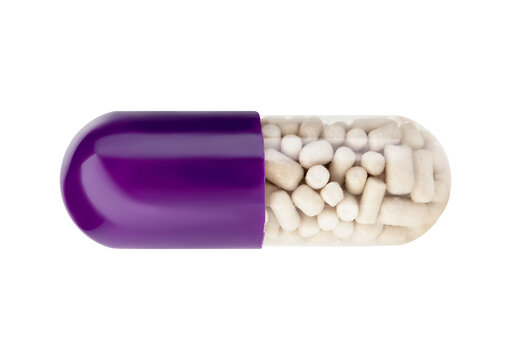 Purple antibiotic capsule with medicine powder spilling out isolated on transparent background