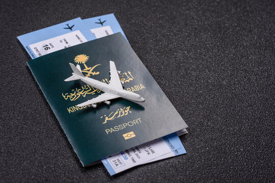 Saudi Arabia passport or id document with tickets for flight, travel. Saudi Arabia passport