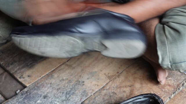Black leather shoes polishing for brilliant shine