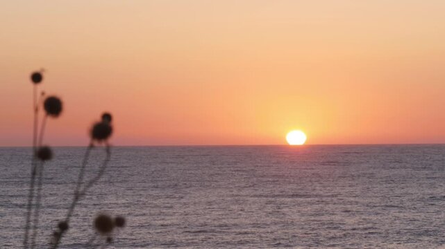 Beautiful Red Sunset on the Sea. Summer Tropical Sunset Sea View. Beautiful Seascape, Red Dusk on the Ocean.