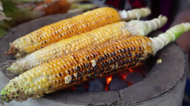 Roasted corn on charcoal with smoky flavor