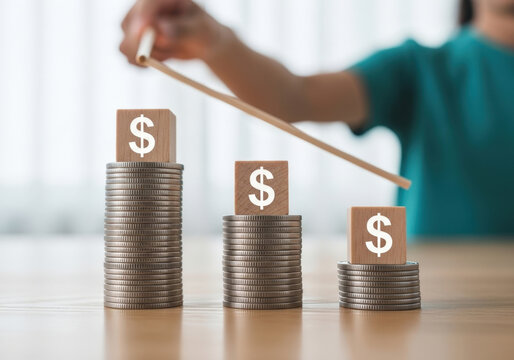 Increasing stack of coins with dollar sign cubes symbolizing financial growth and investment success investment planning wealth accumulation income growth.