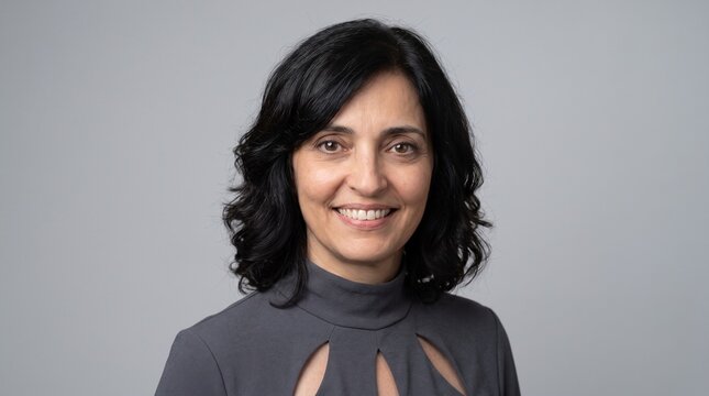 Professional Woman Smiling at Camera Headshot