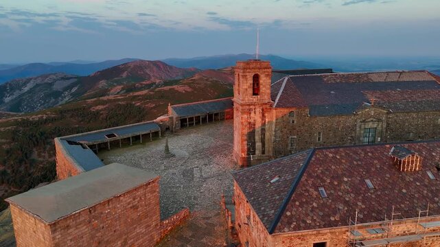The Pe&ntilde;a de Francia Sanctuary, bathed in the golden light of dawn, in Salamanca, Castile and Le&oacute;n, Spain, as seen from a drone