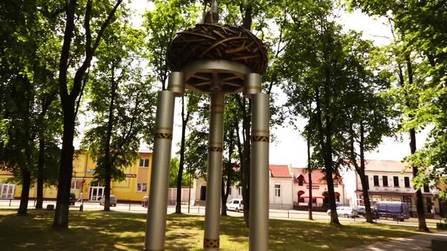 VYSOKAJE, BELARUS - JUNE 11 2022: Genre Stork Sculpture in city square. Belarus, Brest district, Vysokaje, Komsomolskaya street, 1.