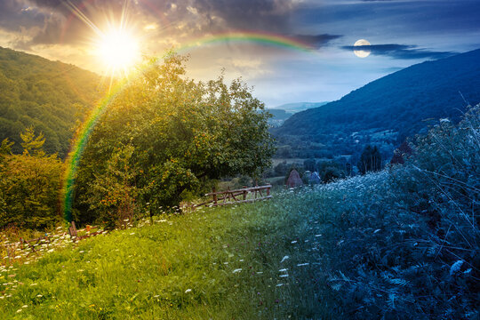 rural mountain landscape of ukraine at twilight. countryside scenery of transcarpathia in summer. night meet day concept. forested hills and grassy meadows under epic sky