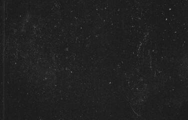 Black grunge texture overlay background with vintage film scratch effects, dust particles, and grain for graphic design. © dileepa