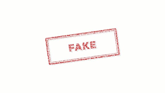 Red rubber stamp with word fake being pressed on white background. 4K Video