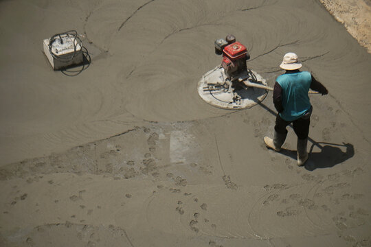 Outdoor Concrete Patio Construction with Floor Hardener