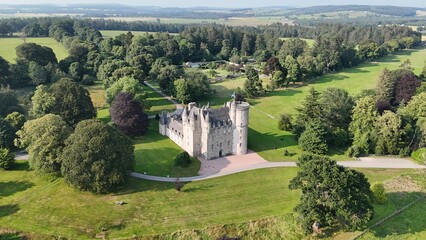Establishing stock photo capturing the ancient castle keep and walled gardens of Castle Fraser Garden and Estate in rural Aberdeenshire, Scotland, United Kingdom © Ramses