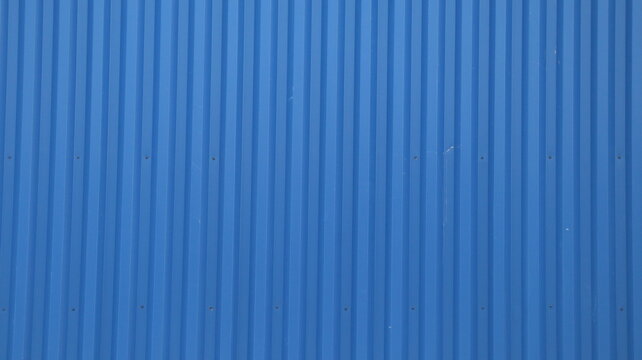Blue Corrugated Metal Wall Texture or Industrial Siding Background
