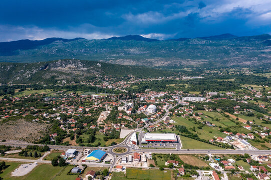 Aerial panoramic view of Danilovgrad town and Zeta River valley, Montenegro