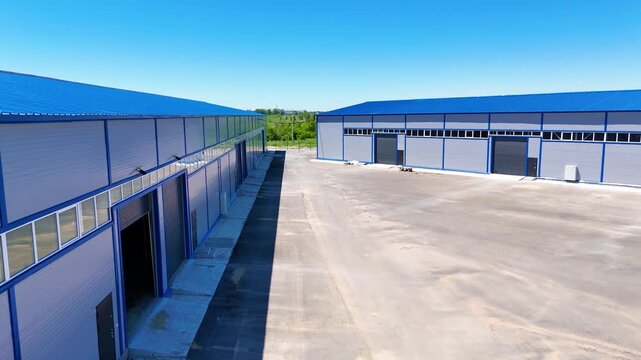 Modern Warehouse Buildings with Loading Area and Industrial Logistics Yard