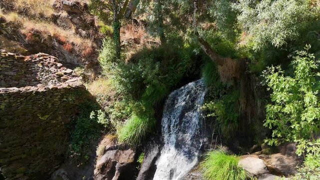 Aerial views of the Mondego footbridges and waterfalls, Videmonte in the municipality of Guarda, within the Serra da Estrela Natural Park, Portugal.
