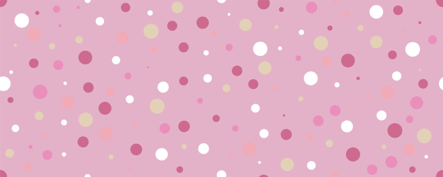 Pink seamless polka dot pattern background with colorful pastel circles for cute design.