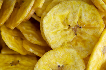 Ecuadorian Chifle Plantain Chips Macro Background © Yessstockphoto