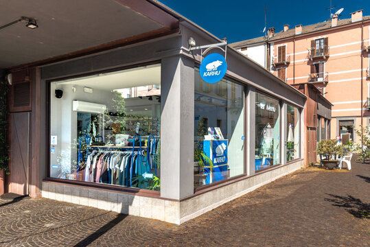 Cuneo, Italy. - July 7, 2026:  Exterior view of the official Karhu store located in Piazza Boves The modern glass storefront windows displaying sports apparel, sneakers, and running clothing, 