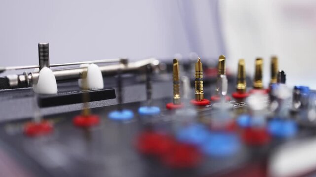 Professional implant dentistry kit with surgical drills and instruments neatly arranged in a specialized cassette.