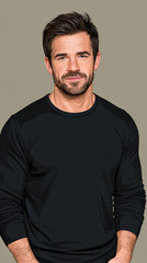 Obraz premium Portrait of handsome man with beard wearing black long sleeve shirt