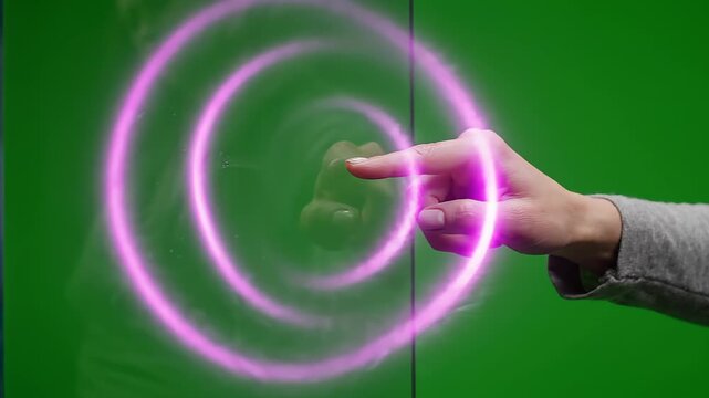 A finger touching a glowing purple circular pulse on a digital screen. Futuristic interface interaction, showing digital connectivity and technology, perfect for motion graphics and compositing.