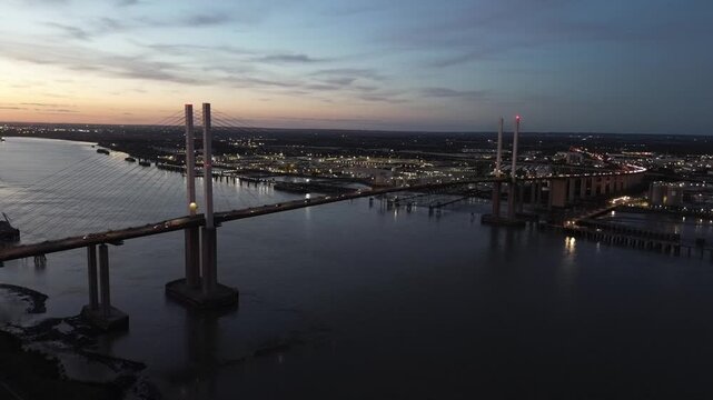 sunset over the river thames at dartford bridge