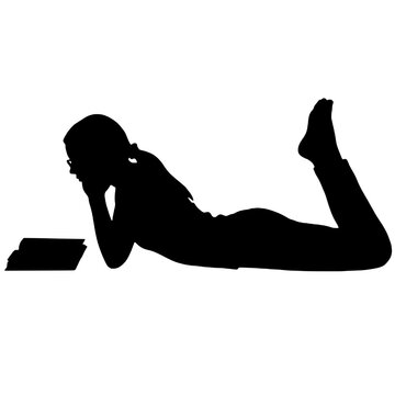 Silhouette of a woman posing while reading a book