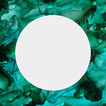 Emerald green and gold alcohol ink art background with central circle copy space