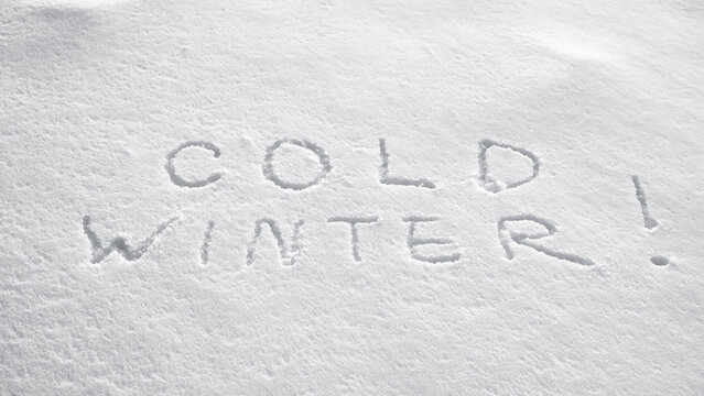 Snowy background, photo of snow texture in winter and letters indicating that it's a cold winter