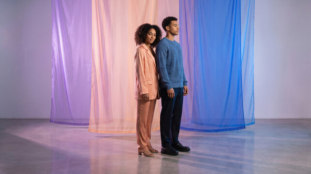 Two-Person Violet-Peach Fashion Portrait With Studio Glow