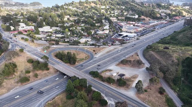 Aerial view of a complex highway interchange and freeway overpass system in a suburban USA landscape