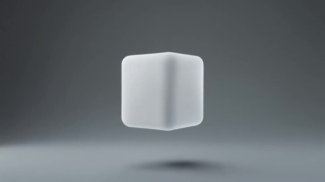Abstract clear cube rotating smooth surface minimalist studio lighting