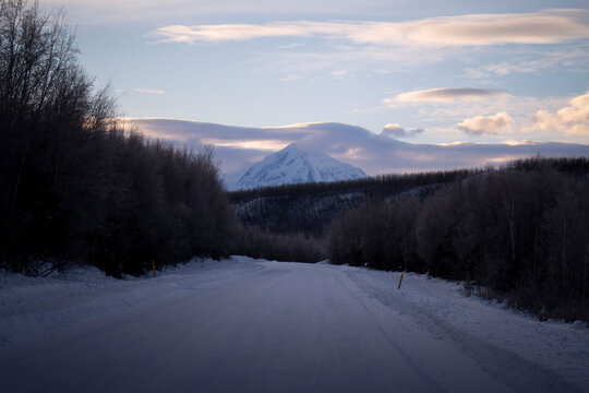 Clouds around mountain peak in Alaska