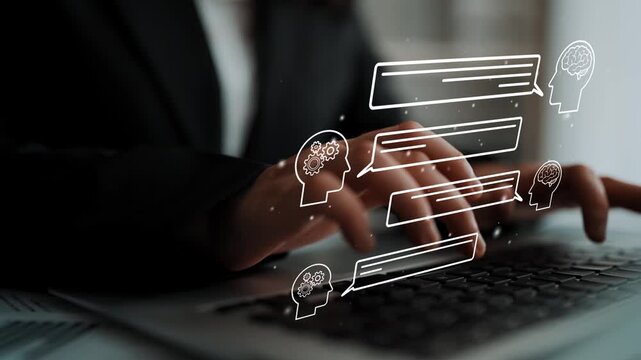Close-Up of Hands Typing on Laptop with Digital Communication Icons Representing Conversations and Ideas in a Modern Office Setting. Entropy.