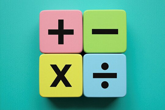 Colorful wooden toy blocks feature basic math symbols for addition subtraction multiplication, division. Square cubes display arithmetic operators against turquoise background. Educational tools help
