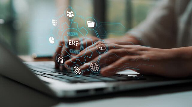 Focused Business Professional Engaging with Touchscreen Laptop Surrounded by Digital Interface Elements Representing Enterprise Resource Planning Concept. Entropy.