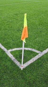 Close-up of a corner flag on a football pitch