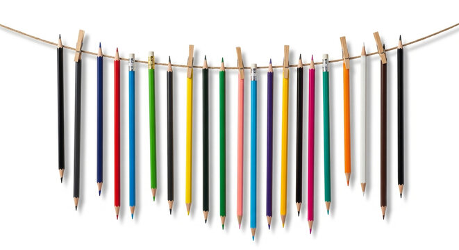 Colorful pencils hanging on a string. Art supplies arranged for creative design projects.