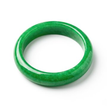 A striking green jade bangle, a symbol of elegance and fortune, showcased in its pure form