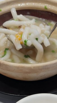 Cantonese Clay Pot Rice Noodles Shahe Fen in Bowl Close-Up Guangzhou Food