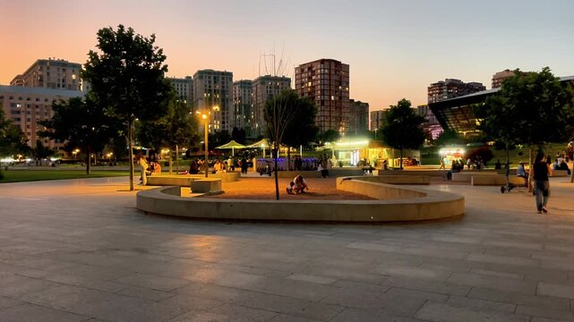 Happy Park Visitors Enjoying a Beautiful Sunset in Baku City