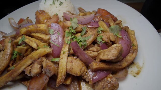 Picking up french fries from Pollo Saltado
