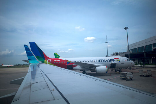 Hang Nadim International Airport Batam Island, Indonesia, November 27,  2024, view from an airplane window.