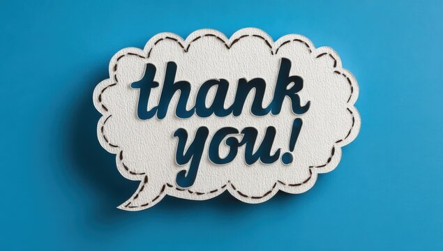 Thank you speech bubble cutout on a blue background, featuring a textured white surface with dark blue lettering and a stitched border design