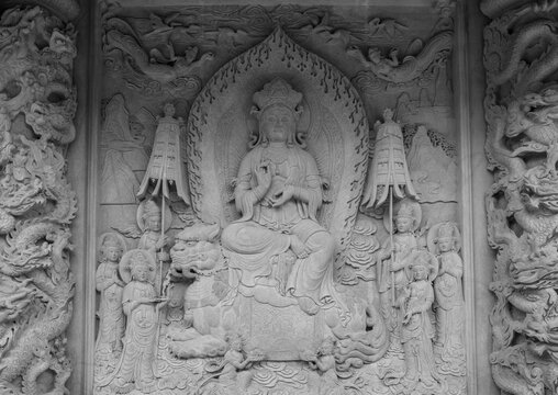 Bas-relief of Bodhisattva on the Wall of a Buddhist Monastery