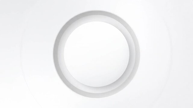 A minimalist white circular design with soft layered shadows