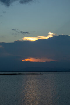 Sunset Over Calm Water