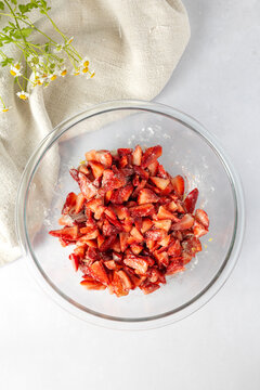 Overhead view of chopped strawberries for baking