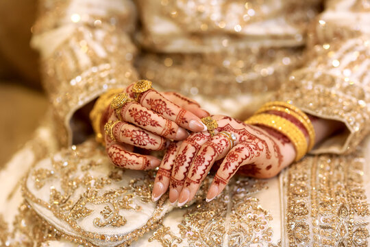 Bridal mehndi- henna tattoo on women hands. mehndi is a traditional indian decorative art. ( mehndi hands), Indian and pakistani wedding tradition.
