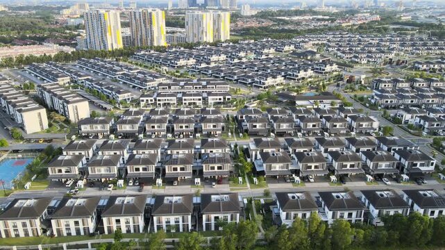 4K Horizontal Drone View of Modern Residential Development in Shah Alam highlights contemporary housing, residential towers, landscaped streets, and well-planned suburban neighbourhoods.
